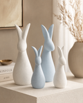 Abstract ceramic rabbit figurines set of 4 in white and blue - front view