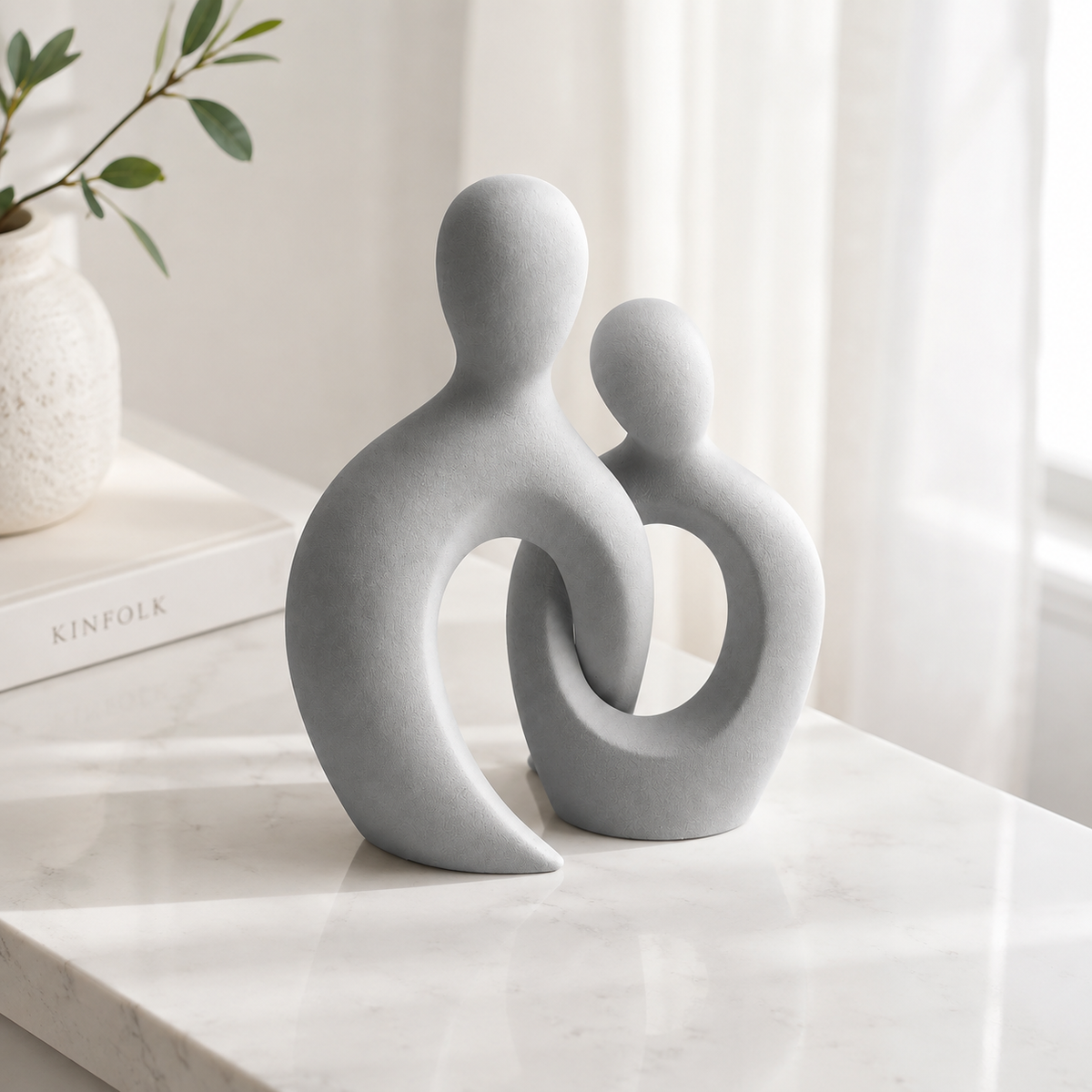Abstract couple figurine close up detail