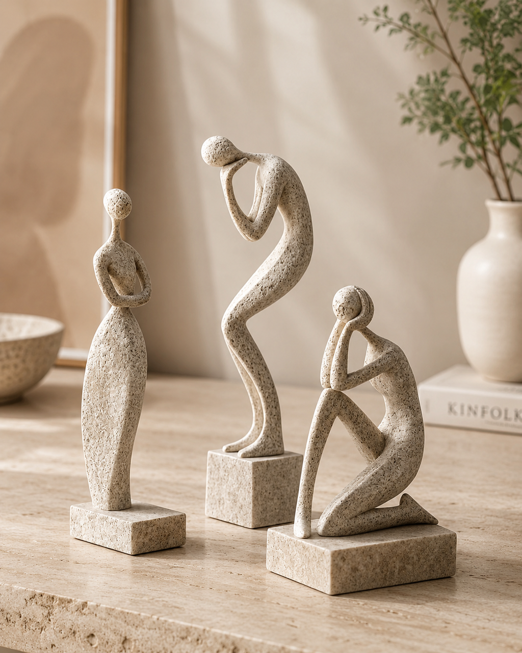 Ceramic horse figurines set of 4 in ivory, black, brown and grey on wooden table